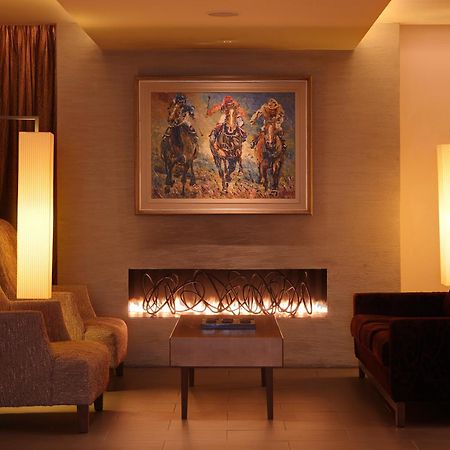 Aghadoe Heights Hotel & Spa Killarney Interiør billede A fireplace in a living room