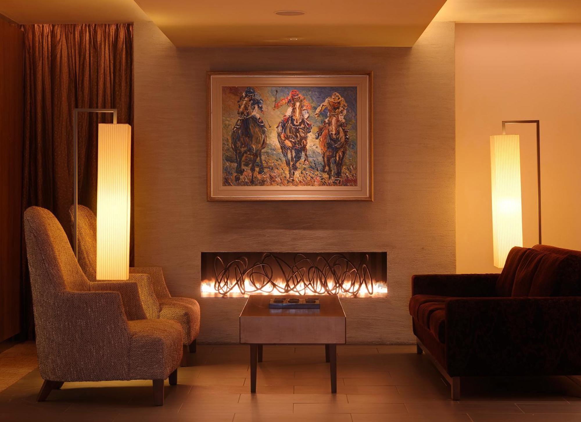 Aghadoe Heights Hotel & Spa Killarney Interiør billede A fireplace in a living room
